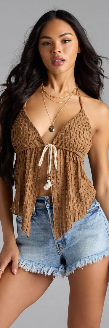 With its midriff cut and trend-forward fit, the Coastal Destination Halter Tie-Front Crop Top is a mocha brown crop top made to pair with skirts, denim, or whatever vibe you're feeling this season.