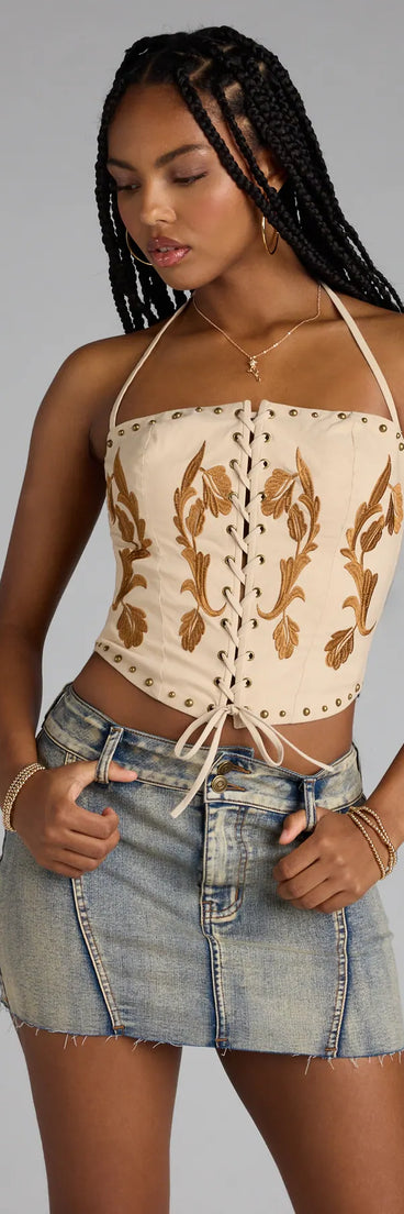 For college campus looks, game day outfits, or a bold going-out vibe, the Legendary Vibes Lace-Up Halter Stud Corset Top is an on-trend beige crop top that easily styles with your favorite denim.