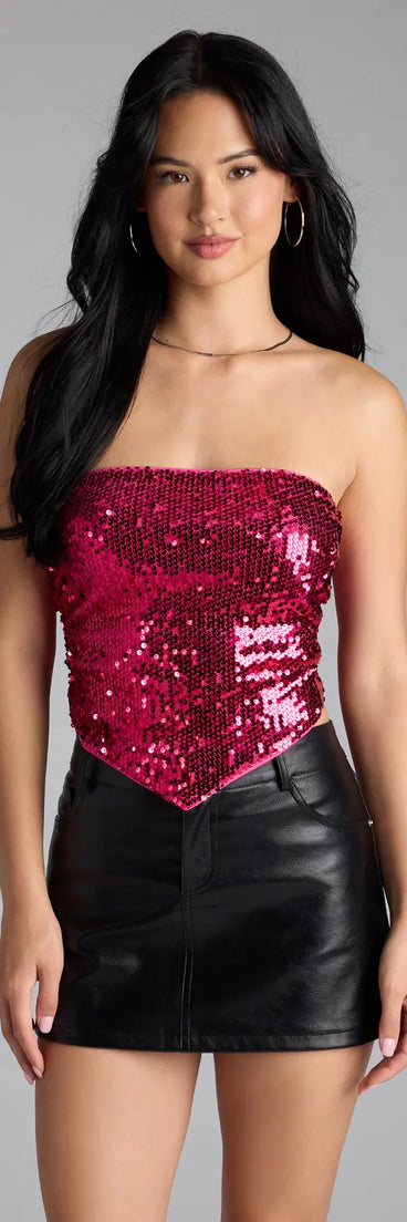 Complete your look with the Caught My Eye Sequin Tie-Back Crop Top, a trendy pink top that’s ready to pair with anything in your fall rotation.