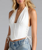 With its midriff cut and trend-forward fit, the The New Classic Halter Lace-Up Denim Corset Top is a white crop top made to pair with skirts, denim, or whatever vibe you're feeling this season.
