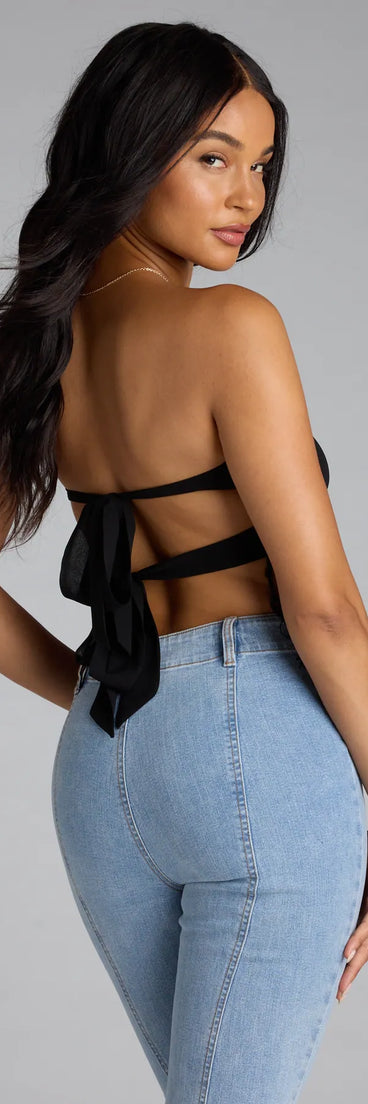 Complete your look with the Love To Dance Strappy Back Fringe Tube Crop Top, a trendy black top that’s ready to pair with anything in your fall rotation.