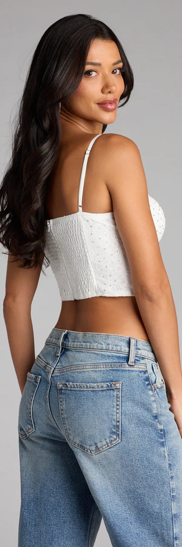 Complete your look with the Daring Sparkle Rhinestone Lace Bustier, a trendy white top that’s ready to pair with anything in your fall rotation.