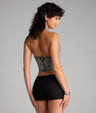 For college campus looks, game day outfits, or a bold going-out vibe, the Laced Up And Unbothered Halter Denim Crop Top is an on-trend black crop top that easily styles with your favorite denim.