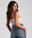 The waist-defining bodice style of the Twisted Angel Embroidered Bodysuit in white is perfect for making a statement with your outfit and provides the structure, molded cups, or lace-up details that capture the corset trend.