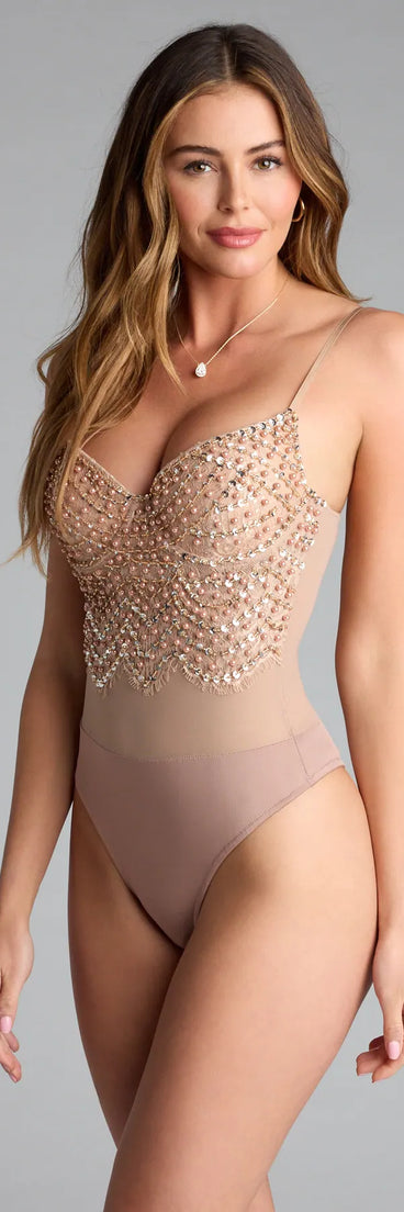 Trendy women’s tops in rose gold, like the Twisted Angel Embroidered Bodysuit, bring effortless style for fall layering, lounging, or going out.