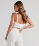 The Dearly Beloved Beaded Pearl And Rhinestone Bustier in ivory is a sequin top with an all-over sparkle, perfect for creating a glam concert outfit or adding shimmer to a going-out look. 