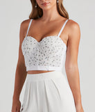 The waist-defining bodice style of the Dearly Beloved Beaded Pearl And Rhinestone Bustier in ivory is perfect for making a statement with your outfit and provides the structure, molded cups, or lace-up details that capture the corset trend.