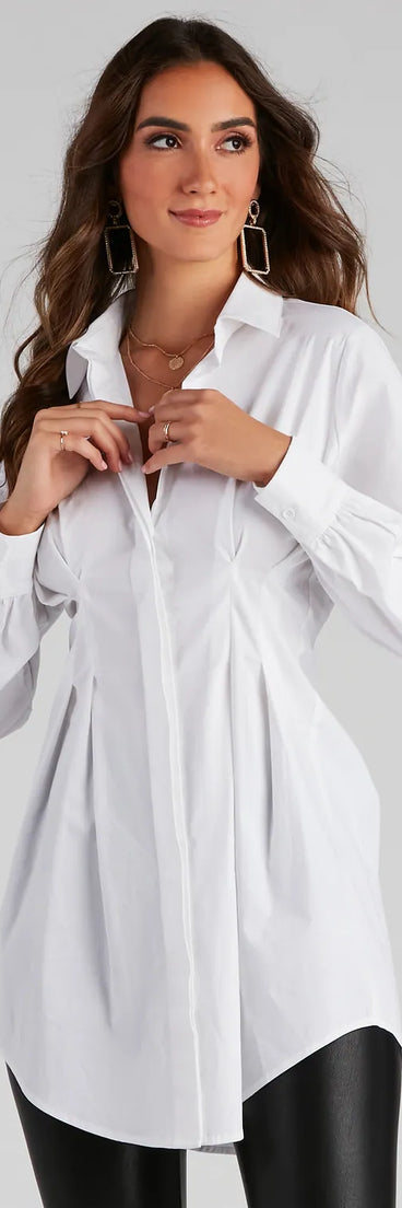 Step into winter chic with the Effortlessly Chic Button Front Tunic, a white mini dress featuring an above-the-knee cut ideal for cocktail parties, festive gatherings, or clubwear.