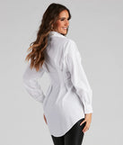 The Effortlessly Chic Button Front Tunic is a mini dress in white, perfect for an above-the-knee holiday party dress or a stylish NYE look, with a short hemline designed to make a winter statement.