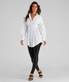The Effortlessly Chic Button Front Tunic is a stunning white mini dress with a short hem, designed to be the perfect winter cocktail dress or night-out look for the holiday season.