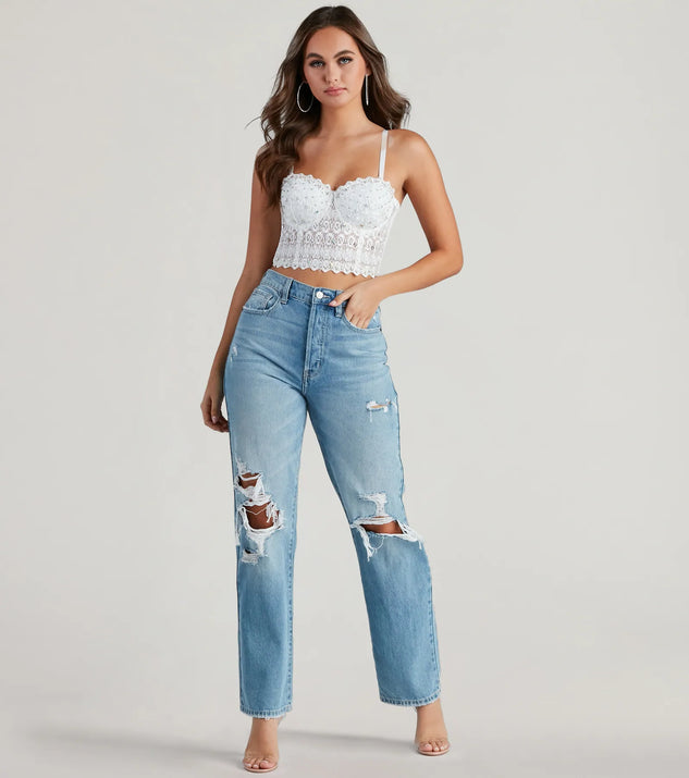 The Reigning Lace Bustier Top in white brings edge and energy to your vibe, ready to elevate any festival look or concert outfit.