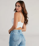 Stay on-trend this season with the Reigning Lace Bustier Top in white, a must-have for creating stylish and effortless summer outfits for women.