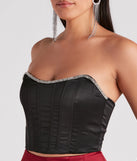 The waist-defining bodice style of the Cause For Rhinestone Trim Bustier in black is perfect for making a statement with your outfit and provides the structure, molded cups, or lace-up details that capture the corset trend.