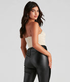 The Cause For Rhinestone Trim Bustier in nude is a sequin top with an all-over sparkle, perfect for creating a glam concert outfit or adding shimmer to a going-out look. 
