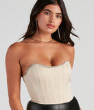 The waist-defining bodice style of the Cause For Rhinestone Trim Bustier in nude is perfect for making a statement with your outfit and provides the structure, molded cups, or lace-up details that capture the corset trend.
