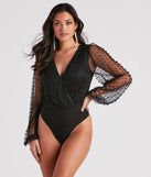 Elevate your seasonal style with the Luxe Be A Lady Faux Pearl Bodysuit, a black bodysuit designed for confident and effortless styling with anything from mini skirts to high-waist jeans.