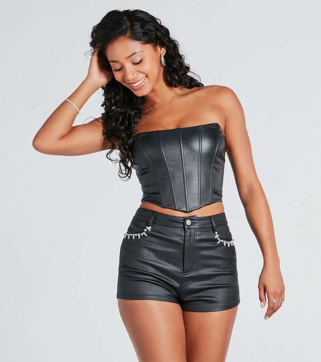 The Popular Demand Faux Leather Corset Top in black with a modern design and trendy look is part of the latest women's tops collection to elevate your 2025 wardrobe.