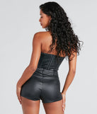 The Popular Demand Faux Leather Corset Top in black is an elevated pick for your best outfit yet, effortlessly delivering a polished look that's sure to turn heads at any celebration.