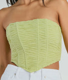 The waist-defining bodice style of the In The Spotlight Strapless Ruched Corset Top in sage is perfect for making a statement with your outfit and provides the structure, molded cups, or lace-up details that capture the corset trend.
