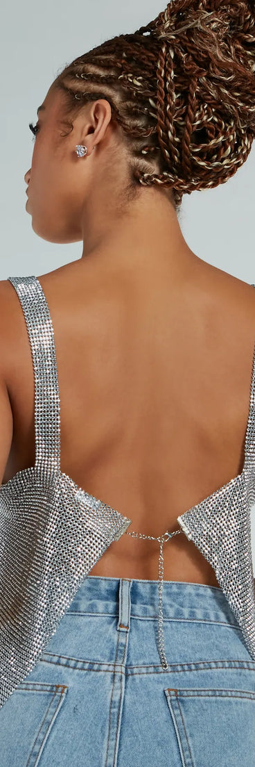 The She's So Dazzling Sequin Chainmail Tank Top in tan is a holiday-ready sequin top with an all-over sparkle, perfect for creating a glam NYE outfit or adding shimmer to a festive holiday look. 