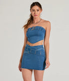 The Daily Vibe Strapless Belted Denim Crop Top in denim blue brings edge and energy to your vibe, ready to elevate any festival look or concert outfit.