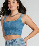 The waist-defining bodice style of the Got The Blues Sleeveless Denim Corset Top in denim is perfect for making a statement with your outfit and provides the structure, molded cups, or lace-up details that capture the corset trend.