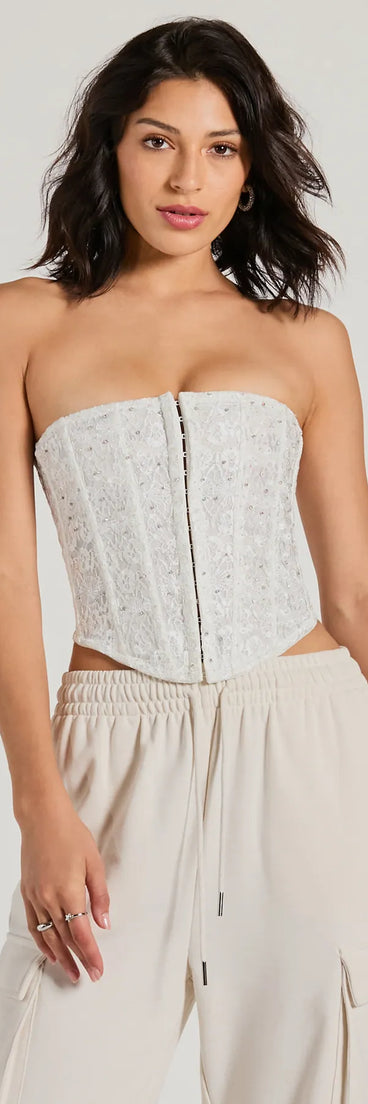 Elevate your 2025 style with the Show Stopper Strapless Lace Beaded Corset Top a chic women's ivory sequin top featuring shimmering sequins and a party-ready silhouette ideal for sparkly festival outfits or club attire.