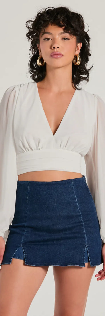 The Chic Credentials Long Sleeve Open Back Chiffon Top in ivory with a modern design and trendy look is part of the latest women's tops collection to elevate your 2025 wardrobe.