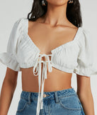 With fun and flirty details, the Fresh Look Puff Sleeve Tie-Front Crop Top shows off your unique style for a trendy outfit for the spring or summer season!
