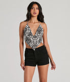 
Upgrade your style game for 2025 with the Sun-Soaked Halter Open Back Paisley Crop Top in black, perfect for any fashion-forward wardrobe.