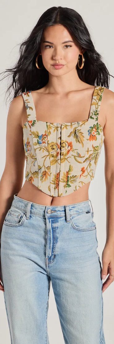 The waist-defining bodice style of the Garden Fantasy Floral Lace-Up Corset Top in multi-color is perfect for making a statement with your outfit and provides the structure, molded cups, or lace-up details that capture the corset trend