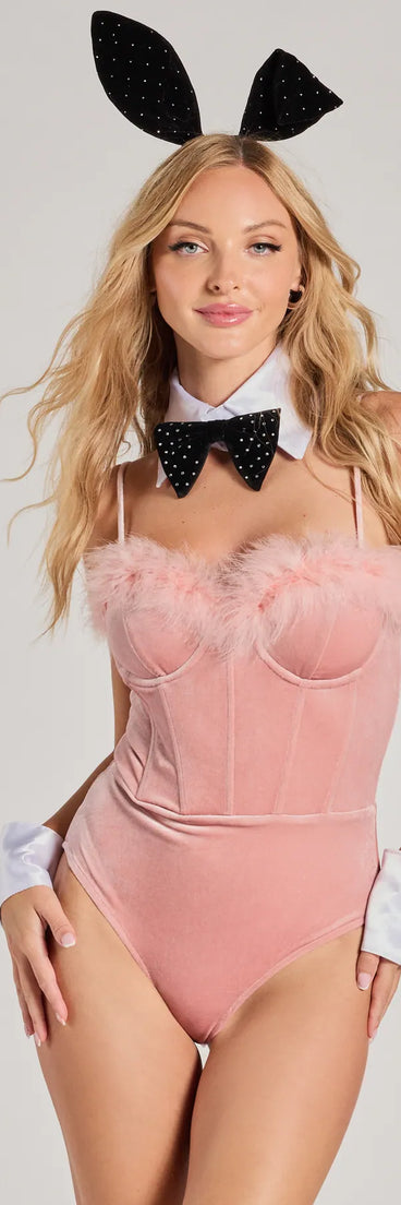 Elevate your winter outfits with the Sleek Appeal Ribbed Knit Long Sleeve Bodysuit, a pink bodysuit designed for confident and effortless styling with anything from mini skirts to high-waist jeans.