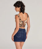 The waist-defining bodice style of the Charming Essence Satin Bow Floral Corset Top in brown is perfect for making a statement with your outfit and provides the structure, molded cups, or lace-up details that capture the corset trend