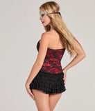 The party-ready Queen Of Midnight Lace Corset Top is a red going-out top showcasing a seasonal color and modern silhouette to create outfits for date nights, cocktail parties, or clubwear.