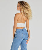 The Sultry Trend Buckle Strap Halter Crop Top in ivory with a modern design and trendy look is part of the latest women's tops collection to elevate your 2025 wardrobe.