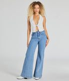 The Sultry Trend Buckle Strap Halter Crop Top in ivory with a modern design and trendy look is part of the latest women's tops collection to elevate your 2025 wardrobe.