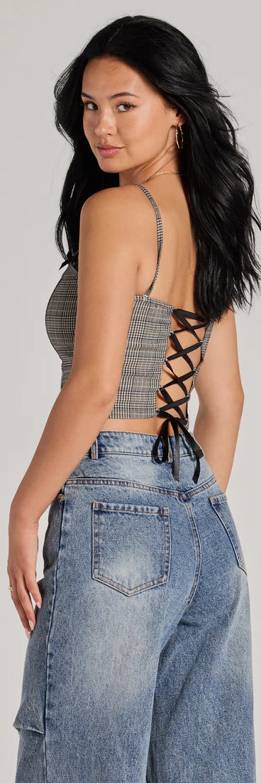 The waist-defining bodice style of the Preppy Vibe Lace-Up Plaid Corset Top in gray is perfect for making a statement with your outfit and provides the structure, molded cups, or lace-up details that capture the corset trend