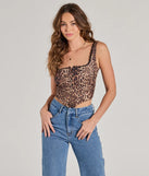 The waist-defining bodice style of the Darling Attitude Leopard Satin Corset Top in leopard is perfect for making a statement with your outfit and provides the structure, molded cups, or lace-up details that capture the corset trend.