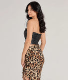 With its midriff cut and trend-forward fit, the Perfectly Sleek Faux Leather Cropped Tube Top is a black crop top made to pair with skirts, denim, or whatever vibe you're feeling this season.