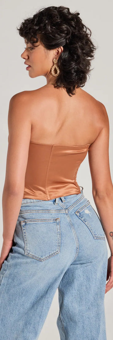 The party-ready Looking Fine Strapless Satin Corset Top is a brown going-out top showcasing a seasonal color and modern silhouette to create outfits for date nights, cocktail parties, or clubwear.