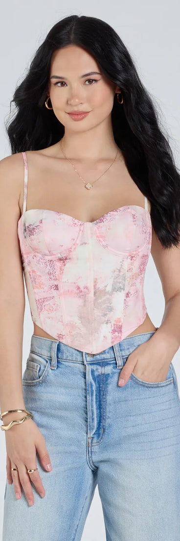 Stay on-trend this season with the One Of A Kind Multi-Print Corset Top in pink, a must-have for creating stylish and effortless summer outfits for women.