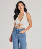 The Edgy Vibe Buckle Detail Halter Crop Top in ivory with a modern design and trendy look is part of the latest women's tops collection to elevate your 2025 wardrobe.