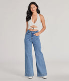 The Edgy Vibe Buckle Detail Halter Crop Top in ivory with a modern design and trendy look is part of the latest women's tops collection to elevate your 2025 wardrobe.