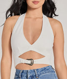 The Edgy Vibe Buckle Detail Halter Crop Top in ivory with a modern design and trendy look is part of the latest women's tops collection to elevate your 2025 wardrobe.