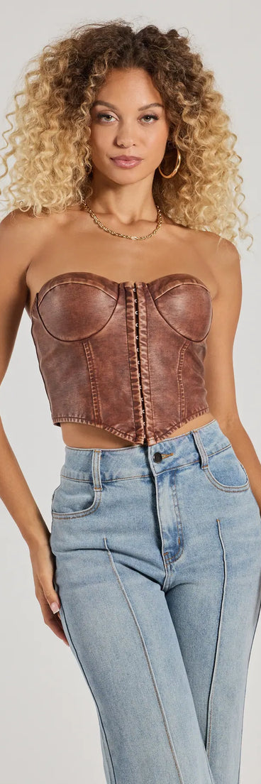 The Boldly Chic Faux Leather Cropped Corset in brown with a modern design and trendy look is part of the latest women's tops collection to elevate your 2025 wardrobe.