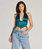The Edgy Luxe Satin Halter Cropped Corset Top in hunter green with a modern design and trendy look is part of the latest women's tops collection to elevate your 2025 wardrobe.