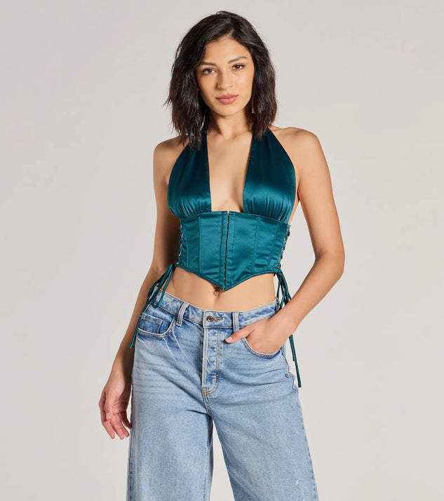 The Edgy Luxe Satin Halter Cropped Corset Top in hunter green with a modern design and trendy look is part of the latest women's tops collection to elevate your 2025 wardrobe.