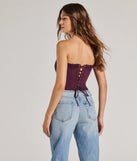 The party-ready Chic And Snatched Strapless Lace Trim Corset Top is a plum going-out top showcasing a seasonal color and modern silhouette to create outfits for date nights, cocktail parties, or clubwear.