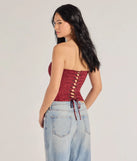 With its midriff cut and trend-forward fit, the Chic Status Brocade Satin Strapless Corset Top is a burgundy crop top made to pair with skirts, denim, or whatever vibe you're feeling this season.