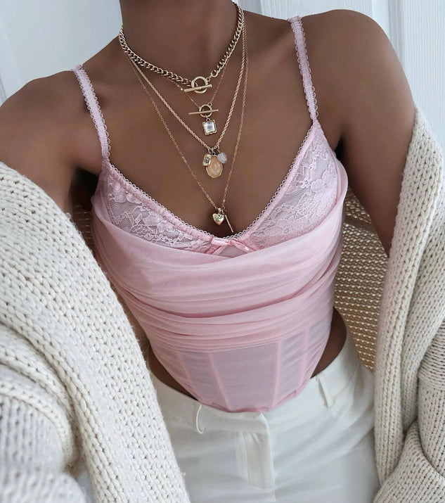 Stay on-trend this season with the Sultry Night-Out Lace Trim Mesh Bustier Top in pink, a must-have for creating stylish and effortless spring outfits for women.